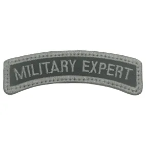 MILITARY EXPERT TAB - BLACK FOLIAGE